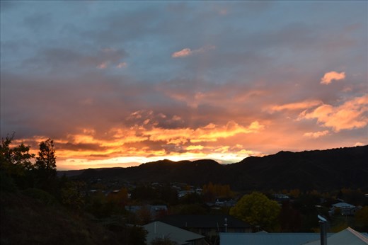 Stunning rose and orange highlights herald the imminent sunrise.