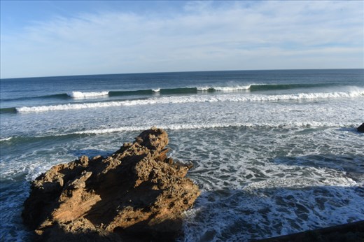 The afternoon breeze whipped spray off the 2nd wave as it continued to break.