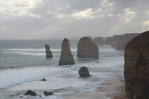 The 12 Apostles loomed eerily as the sun struggled to break through.