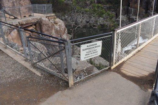 Signs at the bridge entrance warned pedestrians not to get too rambunctious on the bridge ... not a problem for Kent.
