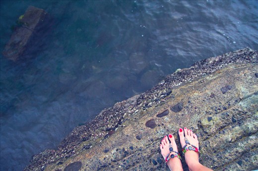 I took this photo just before my boat ride to the vanishing island. The way the ocean and my feet were partitioned by a rock formation simply left me in awe. I had to take a photo of the scene before riding the boat to an island. 
