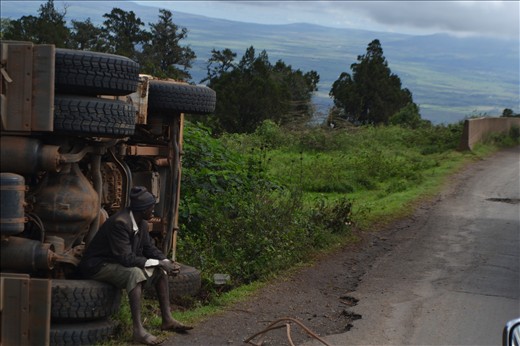 This picture was accidentally taken when our driver told us to get ready to take pictures of the great rift valley. So i stuck my camera out of the window and held down the rapid fire. When i looked at the pictures i noticed that in the left side of the picture there is a truck that has turned over, with a man sitting on the wheel. It a weird picture to look at, because the truck honestly looks like it has been there for a long time, and the man just looks like he is taking a break on a tire. 