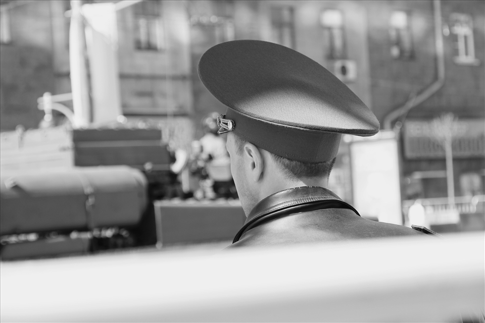 Moscow, Russia: one of russian policeofficer standing behind the fence during the parade rehearsal on 7th of may, 2013