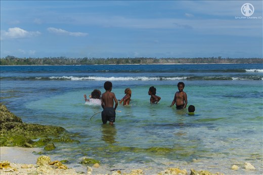 Local children playing in lagoon