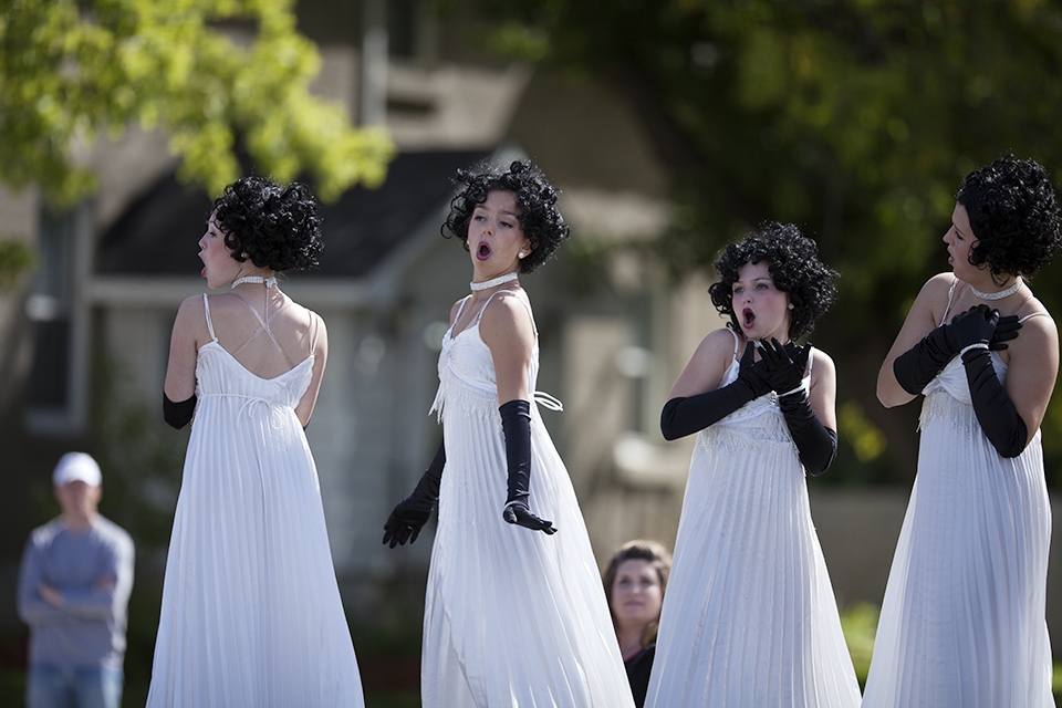 Four girls representing Ottawa’s Step by Step School of Dance pose for the crowd on a float in a parade celebrating the 2012 Richmond Fair. Coverage of the local event was an assignment given to my Photography class at Algonquin College.