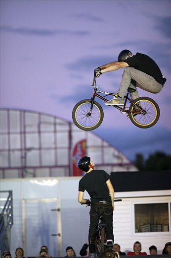 A member of the Craz-E-Crew Stunt Team wows the crowd as he and his bike soar through the air at the 2012 Richmond Fair.