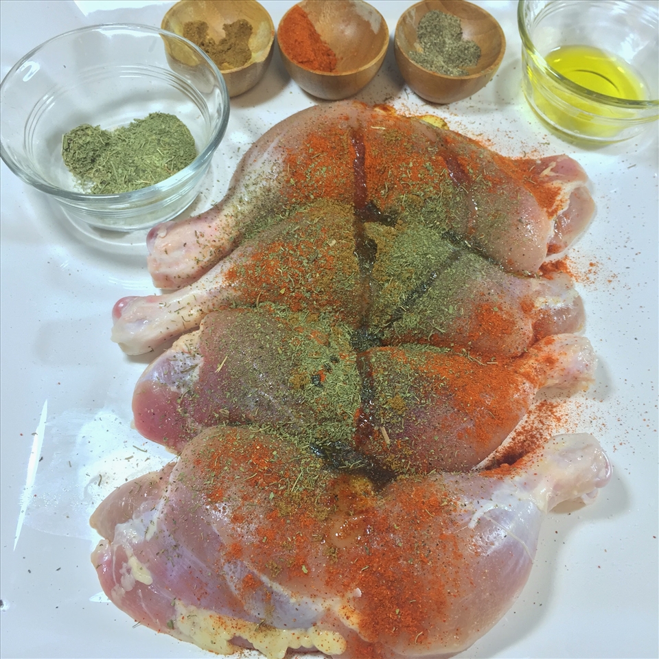 Rubbing the spices is important for flavor.