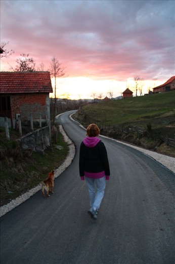 Hiker returns home as sun sets beyond on Mt. Divcibare 
