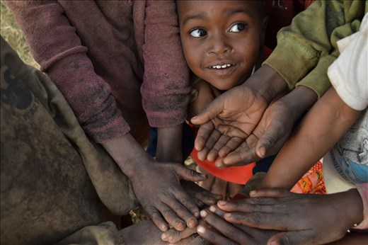 All for one.
One day, Namniaka will be tall enough to put her hands among the others.