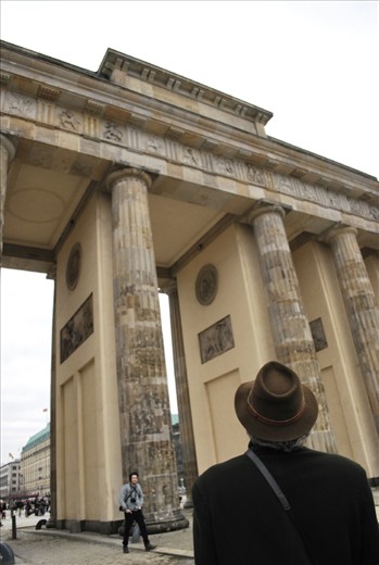 A passing Berliner looking up at the Tor.