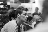 Resting restlessly - Everyone at the travellers loungs is impatient to get home. A traveler waiting anxiously looking at the monitor for the boarding call to his flight: by thebookoftravel, Views[629]