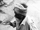 This particular person was counting the coins he earned from someone on the road. They make very little money and live on bare minimum till their death. Most of them don’t make 2$ a day and live in extreme poverty without proper food and shelter. This picture reminds me that Poverty can hit you anytime and change a fulfilling life to mere existence.: by thebookoftravel, Views[5024]