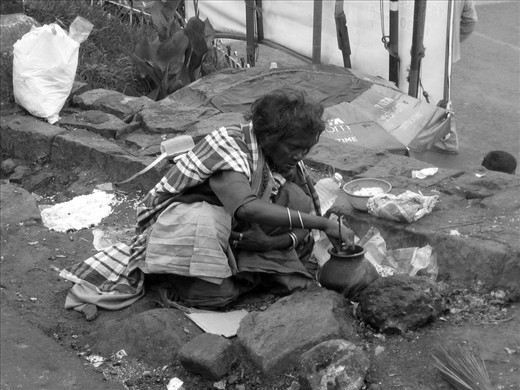 This image portrays an old woman making a meal on the road. She doesn’t have a home or someone else to take care of her. Thousands of people living in the streets of India like her share the same living standards and often develop chronic illness. Basic treatments and medication are generally out of their reach and never in time. 