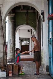 Mr. Soon taking a break on a Sunday, playing with his grandson at the five feet way in front his home.: by theforgottenbambooandrattantrade, Views[593]