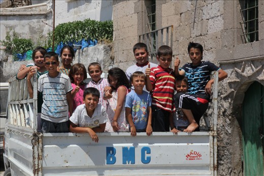 a group of children are prepared to visit the ancient caves, Kaymaklı