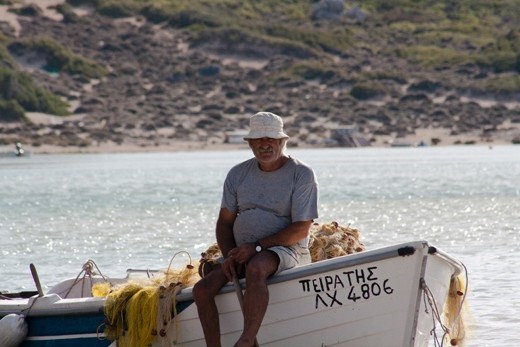 A local fishing for his families restaurant. Crete, Greece.