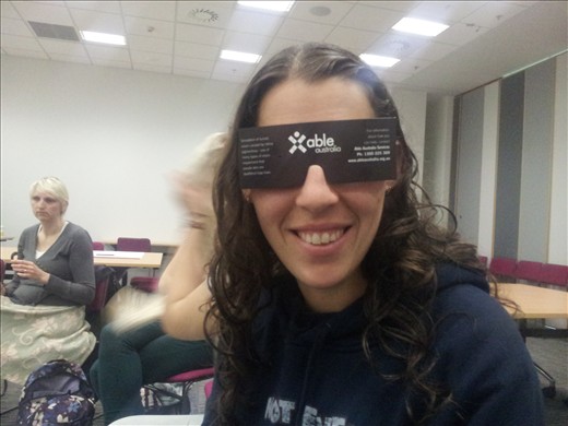Brigette at Deafblind workshop simulating tunnel vision