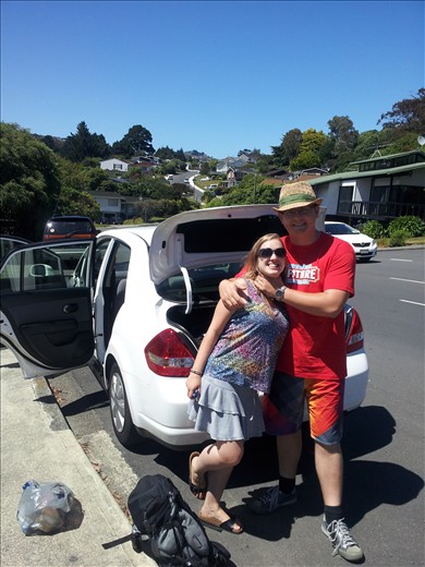 Tom and Zoe ready for the road trip with our rental car Sonny