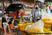 Bangkok, flowers market. a woman doing a flower chain.: by thelandofsmile, Views[354]