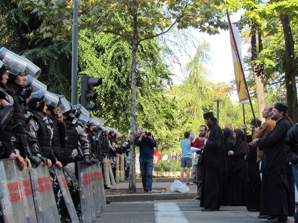 Anti-gay protesters, protesting outside the perimeter of the gay parade