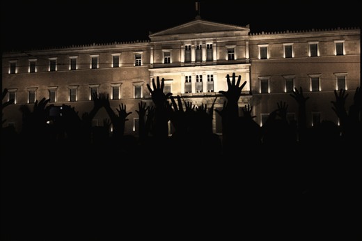 Resentful citizens of Athens, outside the Greek parliament protesting against the new austerity measures caused by the country's entry into the new economical memorandum. January-2012'