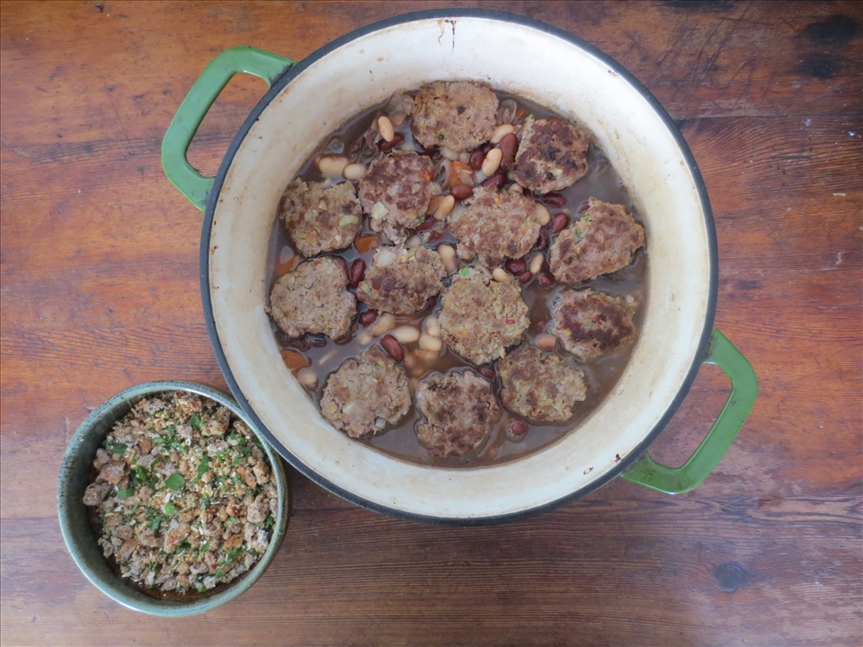 Layering beans and sausages