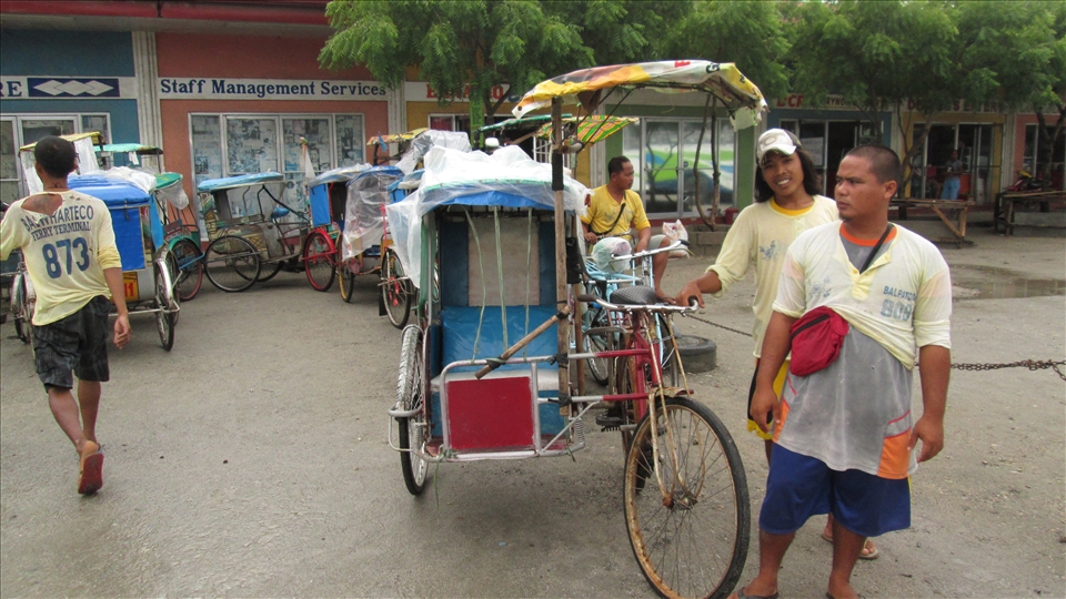 Pedicab drivers at the Allen pier.