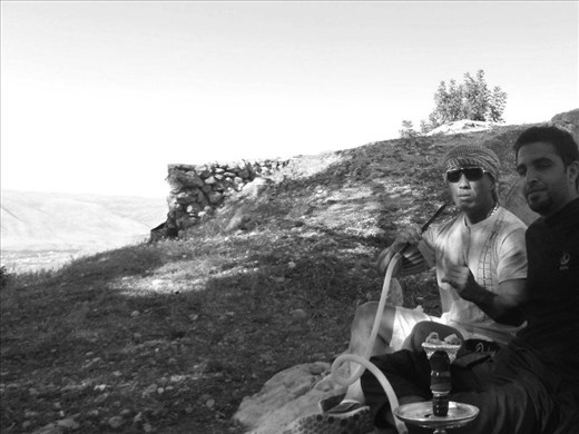 Sometimes it's good to relax. [Smoking a waterpipe (Umm Qays, Jordan)]