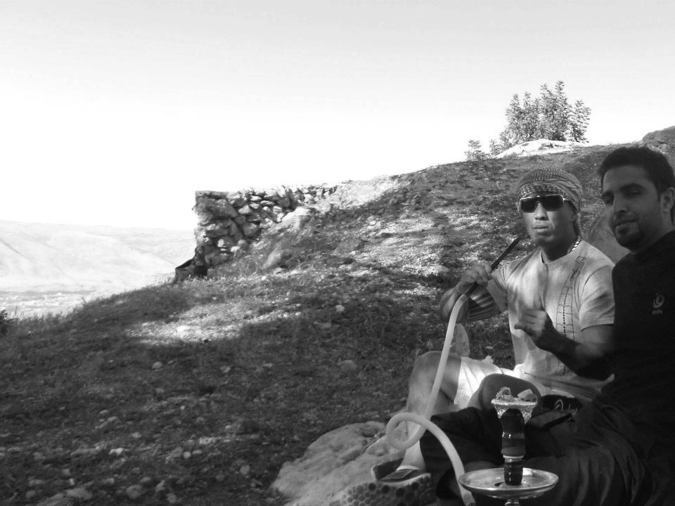 Sometimes it's good to relax. [Smoking a waterpipe (Umm Qays, Jordan)]
