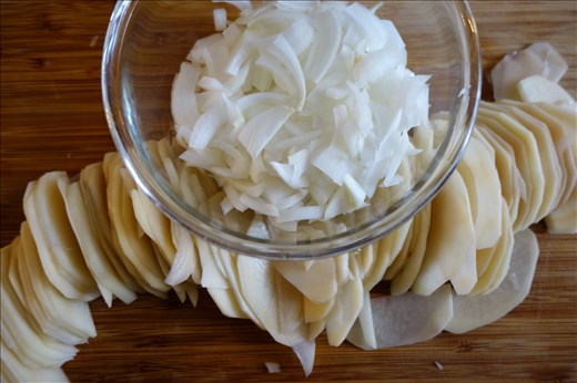 Sliced potatoes and onions ready for cooking