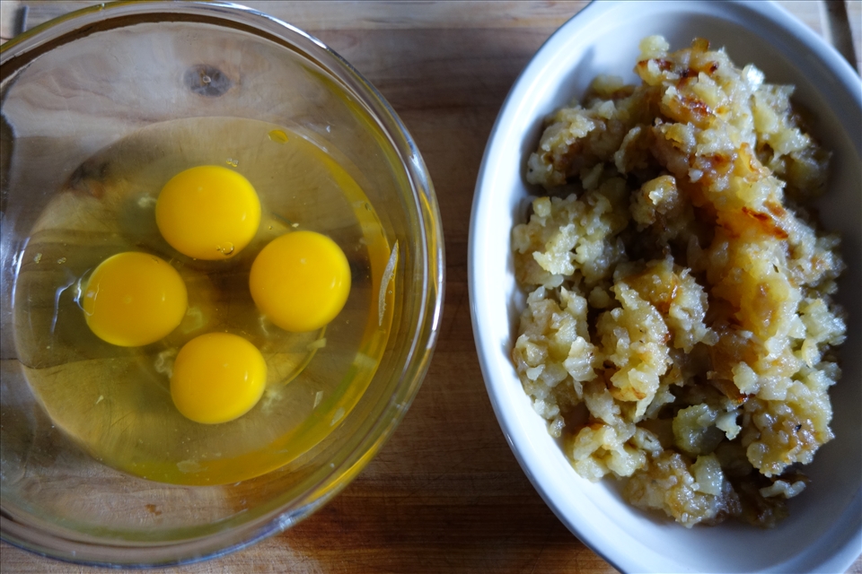 Finished onions and potatoes removed from heat, ready to add eggs