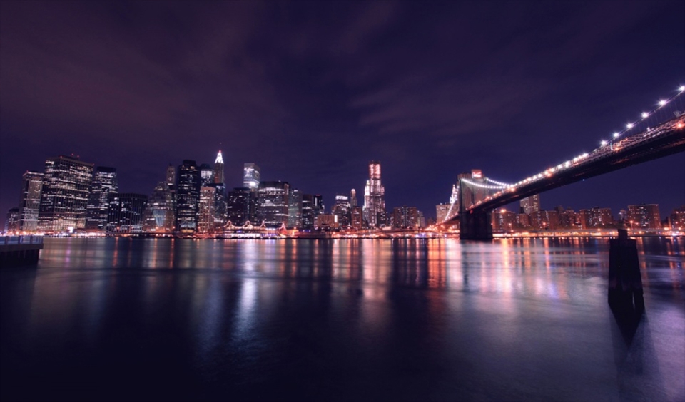 Manhatten, New York City, New York, USA.

A late night/ early morning shot of a city that never sleeps. The  water is calm but the city is still partying. 