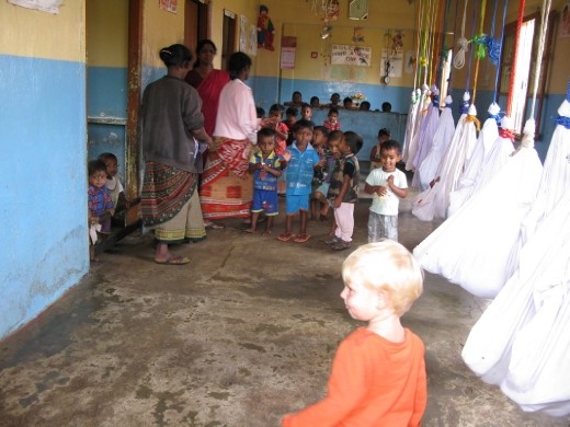 there are babies hanging in the white sacks....this is the tea pickers nursery