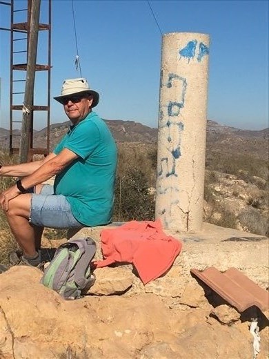 Top of hill behind campsite 