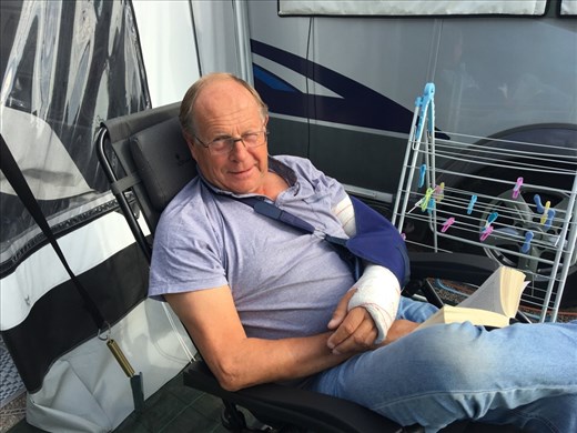 John with his arm in plaster