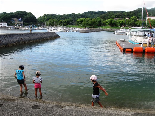 Girls cooling off during a sweltering, hot summer day in Sasaebo, Nagasaki.