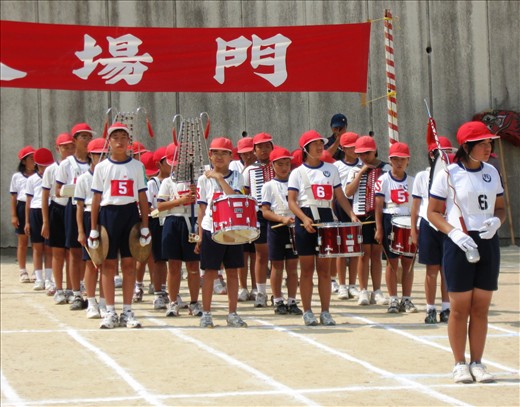 Pupils from Iino Elementary School in marching position during their Sports Day.