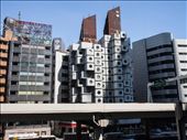 Nakagin Capsule Tower, 1972.

Tokyo urban landscape is shaped by history of war and natural disaster and continual process of restructuring and growth.

This eccentric residential and office building which looks like stack of washing machines is an icon of the postwar Metabolist movement. It is now in a state of disrepair and it is due for demolition and redevelopment. 
: by thidatint, Views[1496]