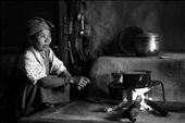 Preparing tea for the family: Yak butter tea is a special Tibetan tradition, so the whole family sits in their one-room house awaiting this unique treat. : by thisiscoop, Views[398]