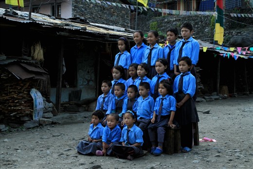 The new generation of refugees: These 18 Tibetan children, posing for a special school photo, are fed and housed at school while their parents work elsewhere to earn a living.