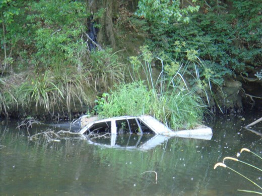 Car in the river, Nimbin, NSW