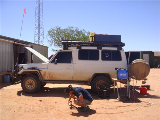 Carlo doing some welding on the car, Cameron Corner, SA