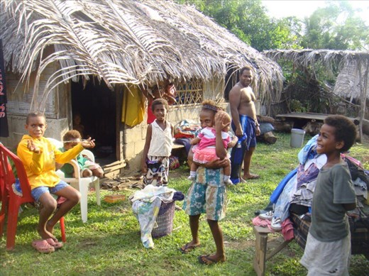 Family happy to be back after being away for 6 months, Caroline Bay, Malekula.