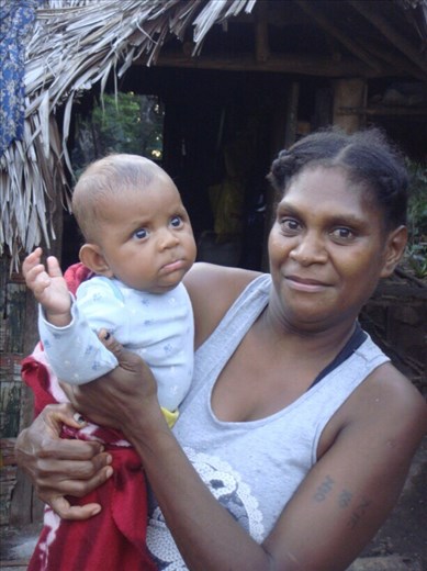 My mom Flavianna with my baby sister Gianne, Caroline Bay, Malekula.