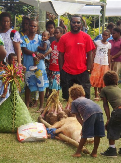 Curious kid looking at the dowry, Banban, Espiritu Santo.