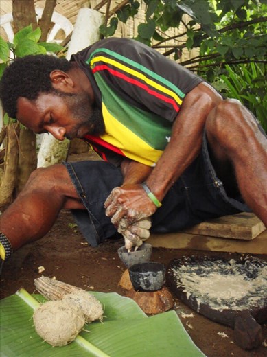 Squeezing kava into coconut shells, Lombaha, Ambae.