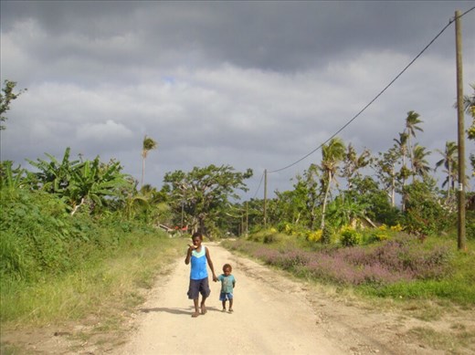 Antoine and Hipio out for a stroll, White Sand road, Tanna.