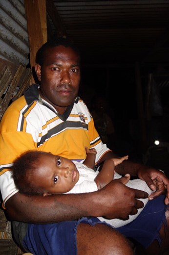 Robert with his youngest Ruth, Lownelapen, Tanna.