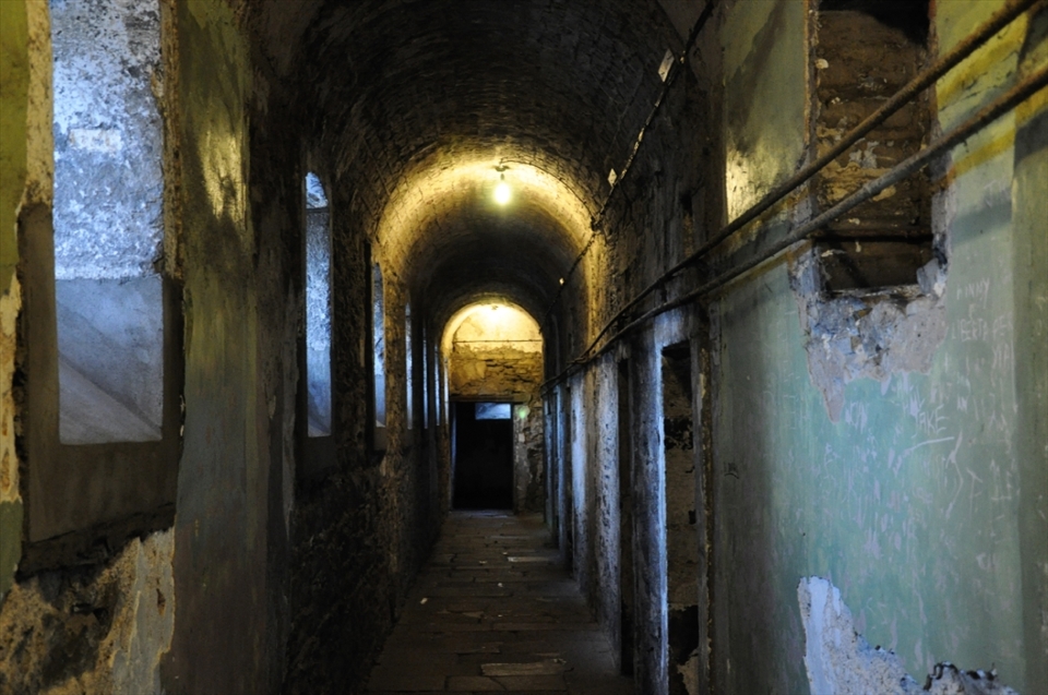 Darkness - Kilmainham Goal. One of many dark and dreary halls from inside the prison. The lack of empathy the halls had for it's many prisoners is displayed with the many names that are spread out down the walls.