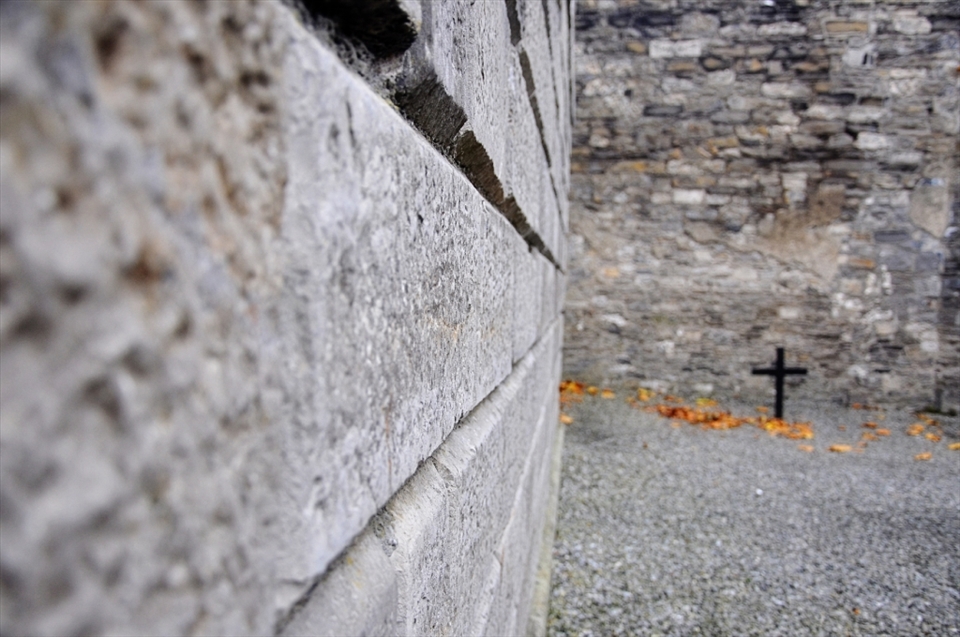 The Reminder - Kilmainham Gaol. What a powerful and painful image in the execution courtyard. This stark, simple cross is the symbol for the executed martyrs as well as Irish nationalism.